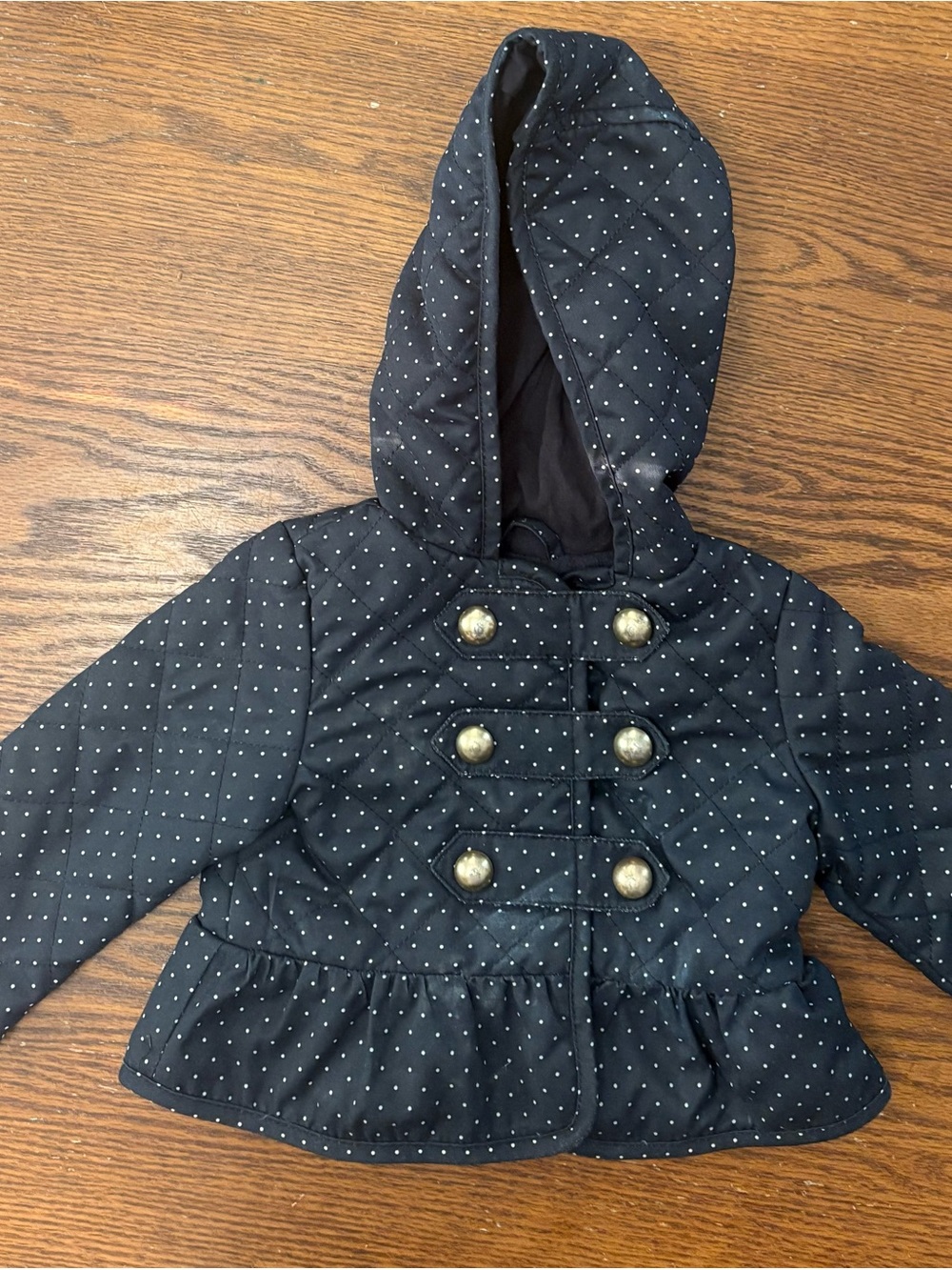 Girls' navy blue Hooded Quilted Peplum Jacket with Gold Buttons. 12-18m